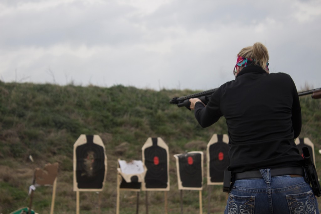  Ginger Peacock, who founded the Marietta, Ga. A Girl and A Gun chapter, takes aim during a shotgun home defense class at the T.I.G.E.R Valley outdoor range in Waco, Texas.
