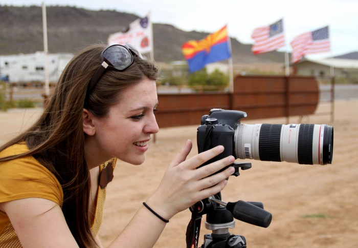 Jessica Boehm reports at the Western Range SASS shooting event in Northern Phoenix. Photo by: Emilie Eaton