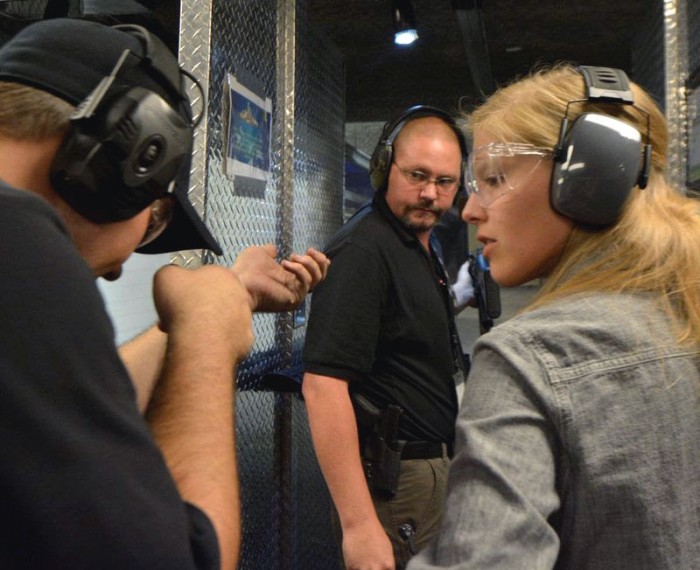 Carmen Forman reports at Range 702 in Las Vegas, Nevada. Photo by: Jacob Byk